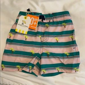 Shade critters palm tree swim trunks